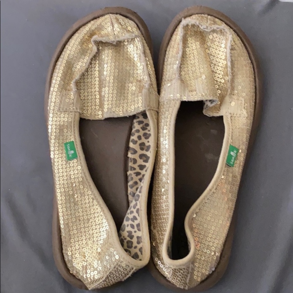 Sanuk gold slip ons